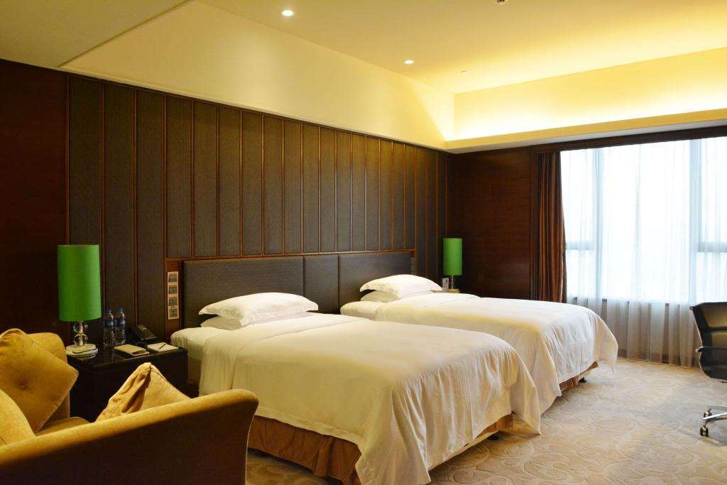 Malachite Hotel Dongguan Дунгуань Номер фото