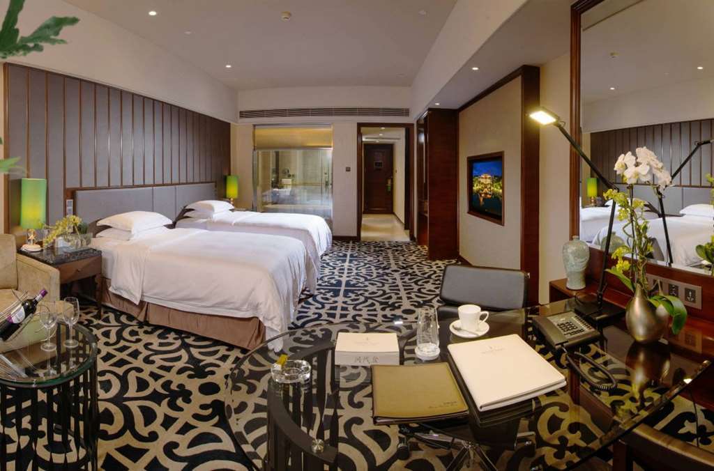 Malachite Hotel Dongguan Дунгуань Номер фото